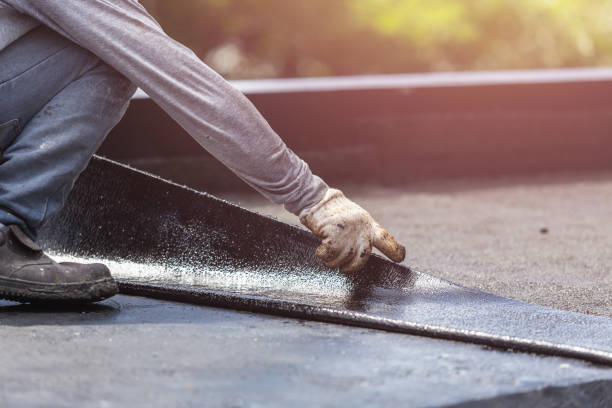 Professional Basement Waterproofing technician working in Brant, MI